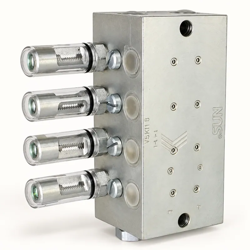 Dosificador metálico alargado con múltiples salidas y conexiones roscadas para lubricación centralizada · SKF LL/620-40015-7